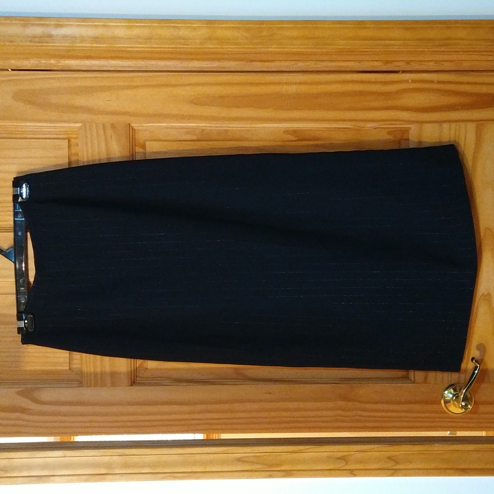 Vintage long black pinstripe skirt with a slit in the back
